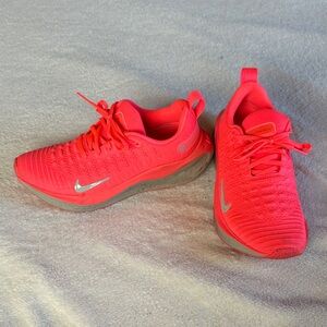 Nike Vibrant pink Athletic Shoes react x infinity run 4